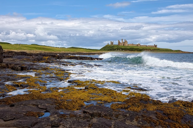 View of Dunstanburgh Castle at Craster Northumberland