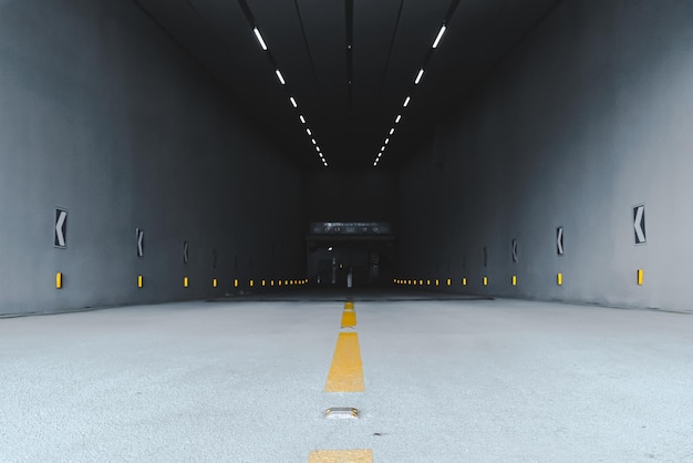 Photo view of empty illuminated tunnel