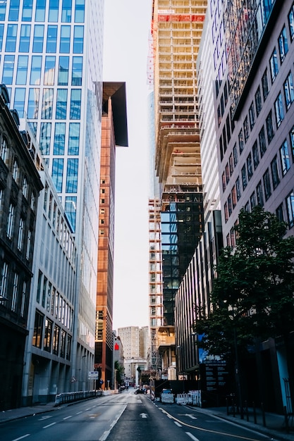 View over an empty street in the business quarter with skyscrapers made of glass