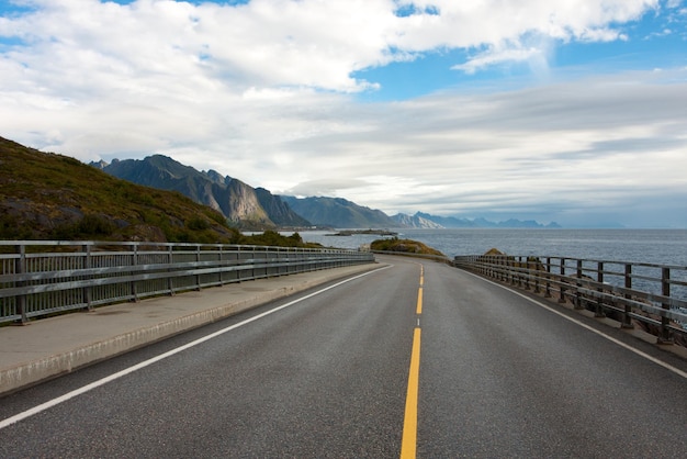 View of an empty winding road at the Lofoten islands