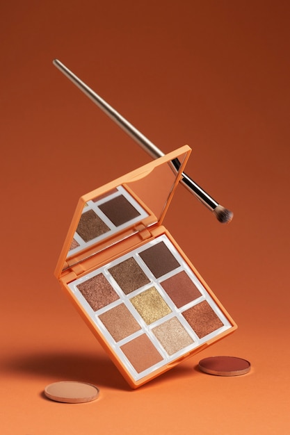 View of eyeshadow palette with brush applicator