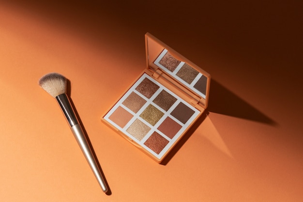 View of eyeshadow palette with brush applicator