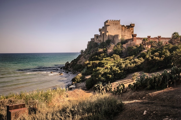 View of the Falconara castle in Sicily during sunset