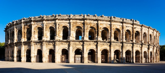 View of famous amphitheater in the morning Nimes France