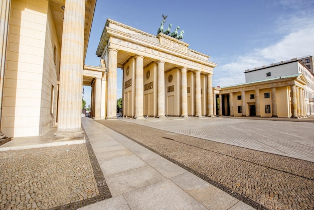 View on the famous Brandenburg gates on the Pariser square during the morning in Berlin city