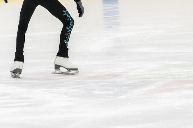 View of figure skater feet at the figure skating practice