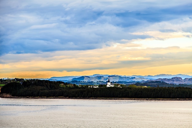 View on forest, coast and mountain from water