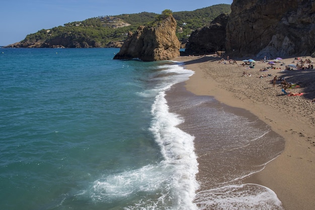 A view from above of a beach with big rocks