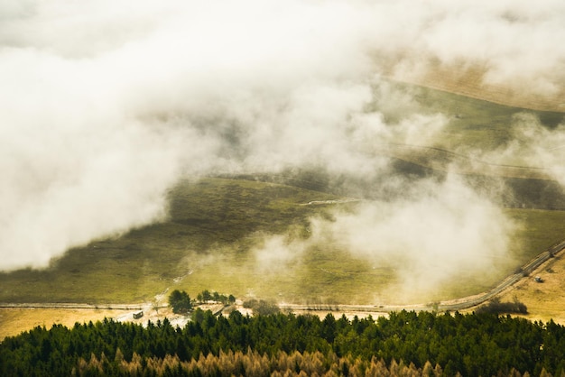 View from Cerenova rock in West Tatras near Liptovsky Mikulas city in foggy weather Slovakia