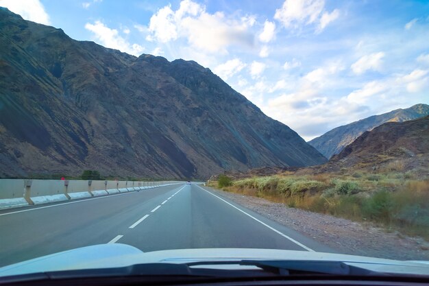 View from the cockpit of a car riding the mountain road