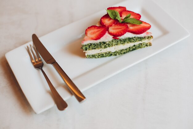 View from above of delicious cake with strawberries