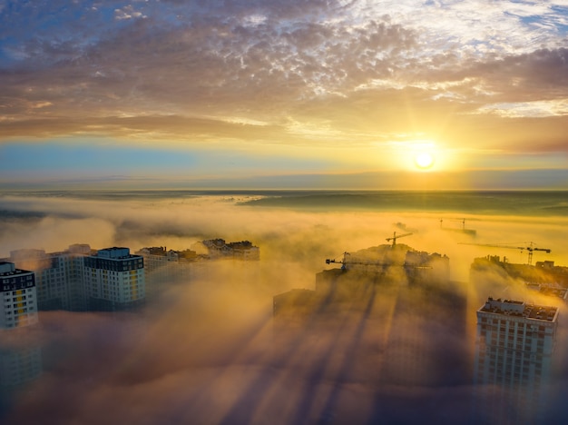 View from the drone at dawn in the fog