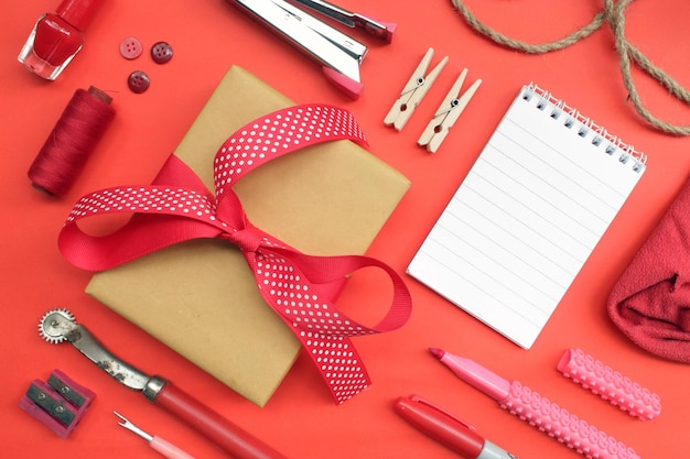 View from above flat lay photo of red ordinary object on red background