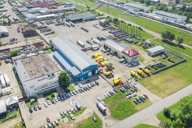 Photo view from the height of the industrial buildings and parking of special equipment