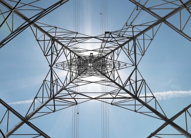 View from under the high voltage pole on sky background