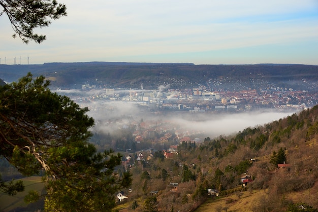 view from the mountain to the misty city