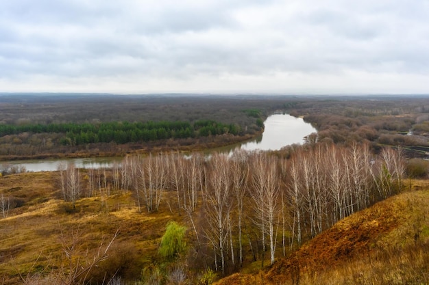 Photo view from nikolskaya mountain to the river sura and autumn landscape