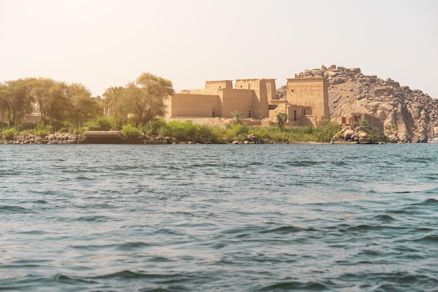 View from the nile river of an egyptian temple