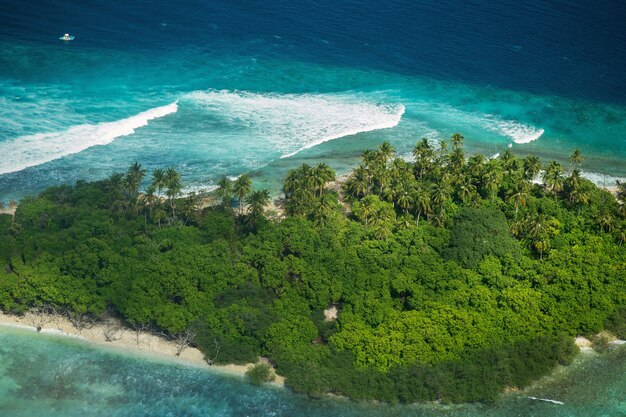 View from the plane on the island located in the Maldives