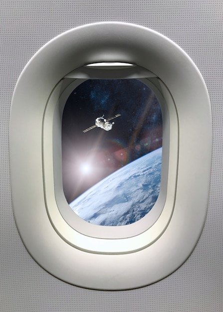 View from porthole window on spacecraft launch into space