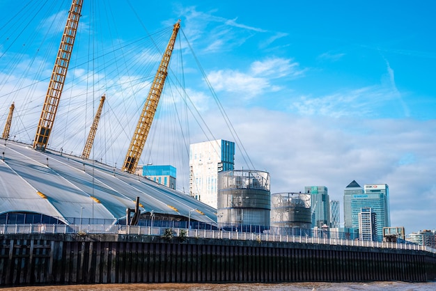 View from the river Thames over Millennium dome or O2 Arena in London, UK.