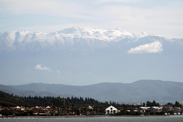 View from the sea to the city of fethiye with snowy mountains in the background