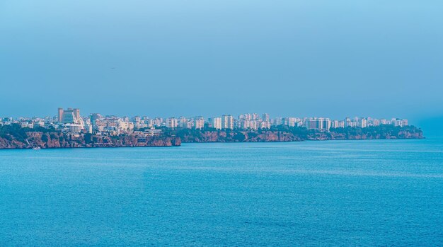 View from the sea on the coast of Antalya in the aerial haze