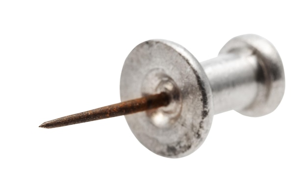 Photo view from tip on vintage steel push pin isolated