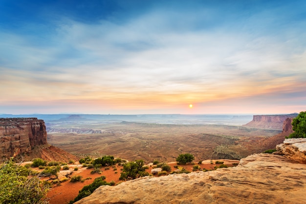 View from the top of sandstone mountain at sunset