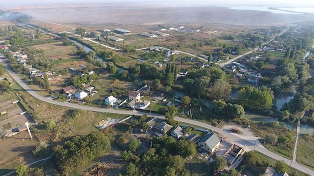 Photo view from the top of the village houses and gardens countryside rustic landscape aerial photography