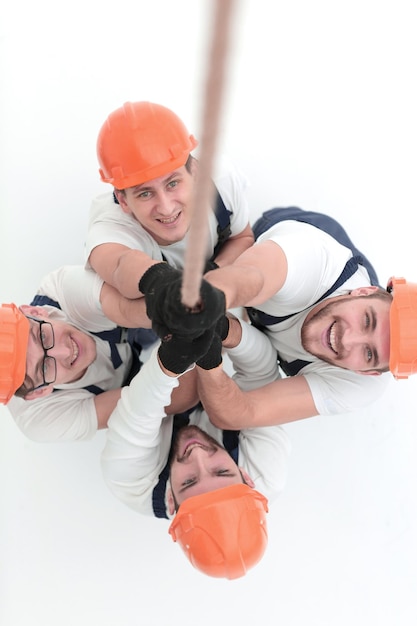 View from the topa group of workers pulling a rope