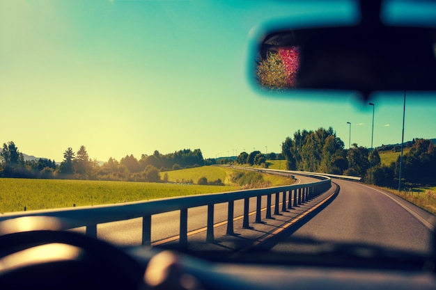 View from the windscreen Driving a car on the road Nature Norway