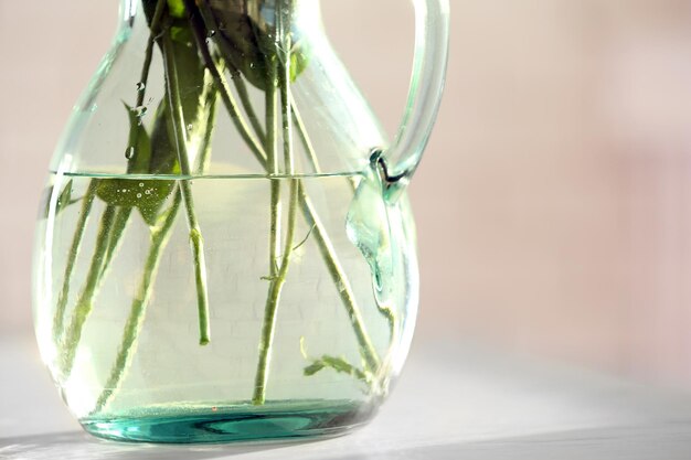 View on glass vase with flowers closeup