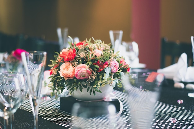 view of glasses and vase on dining table
