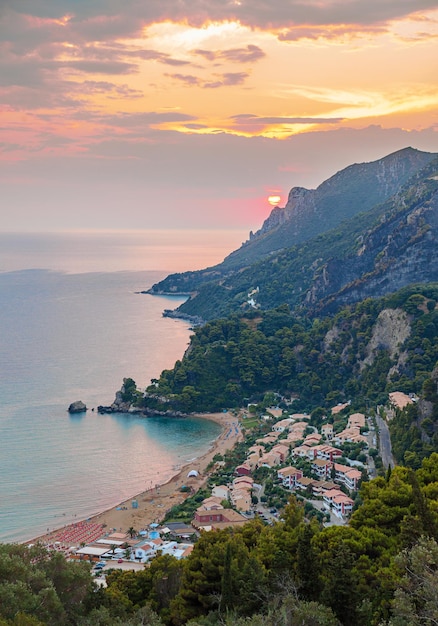 View of Glifada village on Corfu coast at sunset, Greece