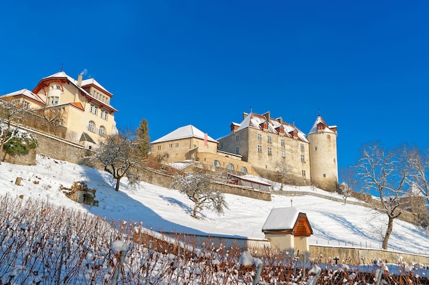 View of the gruyeres castle in canton of fribourg, switzerland on a sunny winter day