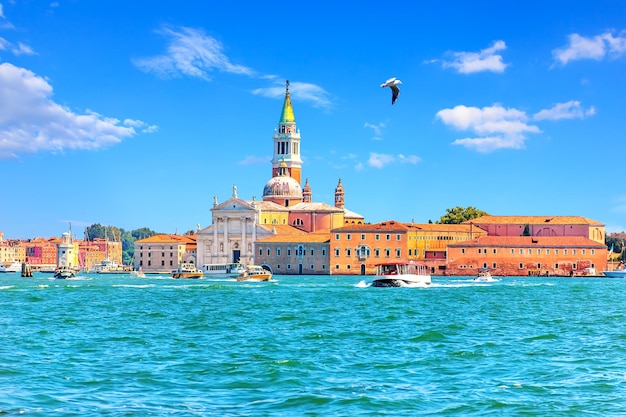 View on Guidecca island with its Church and boats Venice Italy