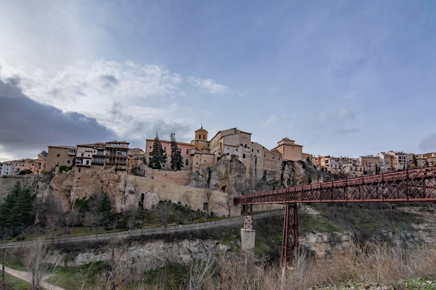 view of the hanging houses and the iron bridge of the city of Cuenca, Spain