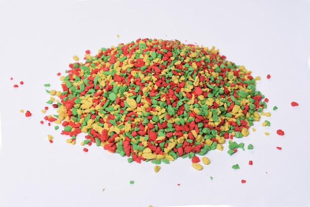 View of heap of colored vitamins for birds