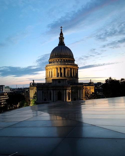 Photo view of historic building against sky during sunset