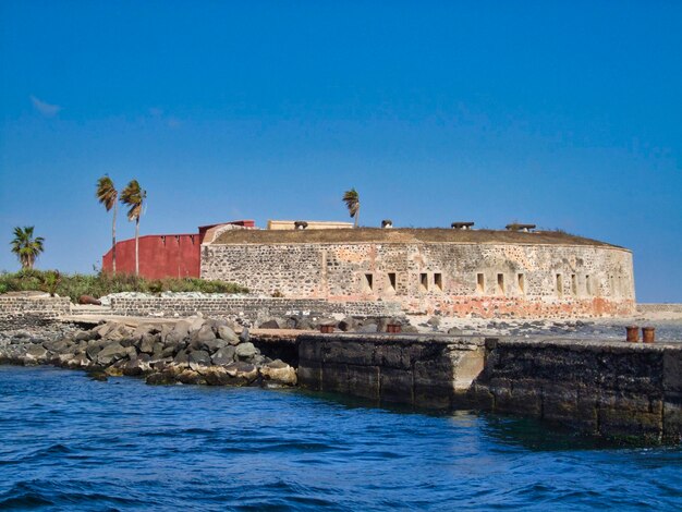 View of historical building against clear blue sky