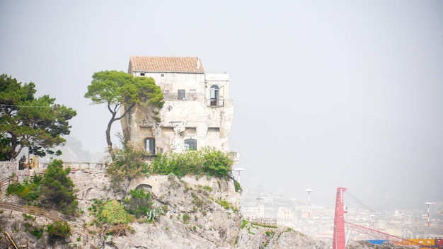 View of the home on the hill above the water