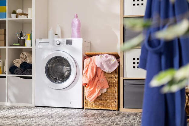 Premium Photo | View of home laundry room dresser with detergent powder ...