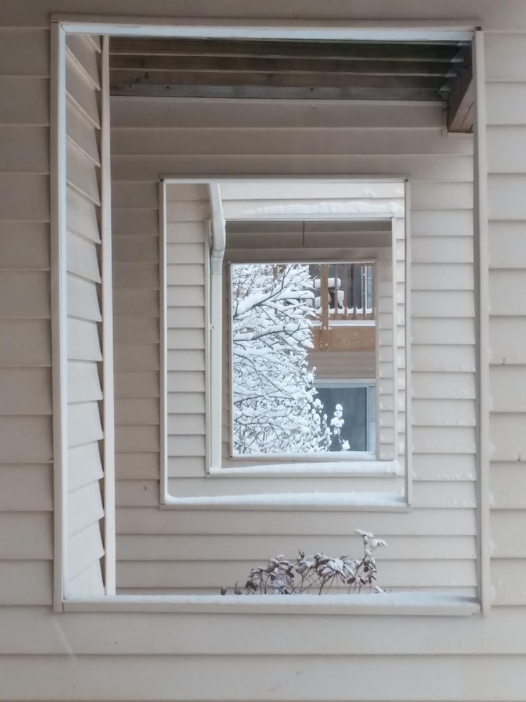 Photo view of house through window