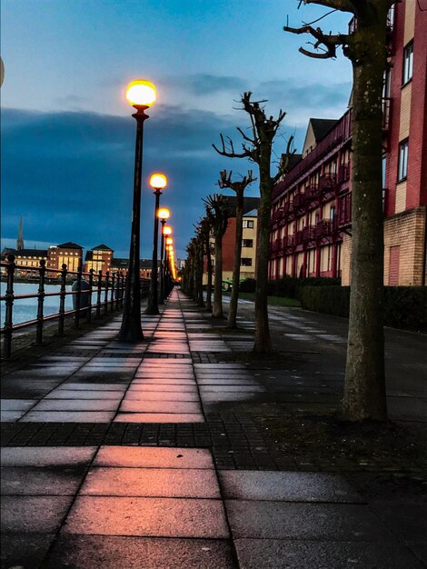 View of illuminated street at night