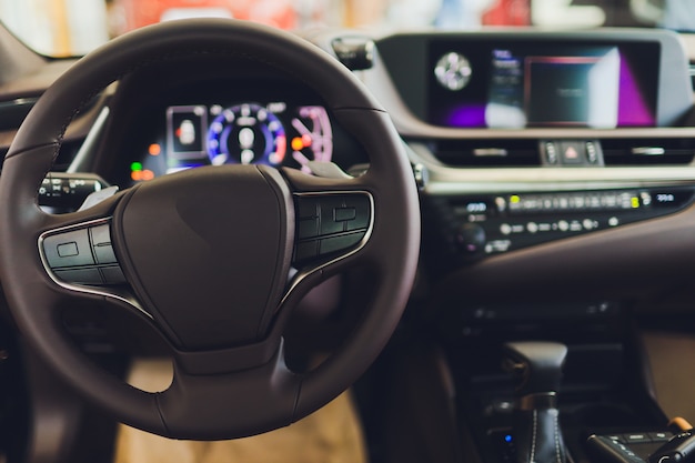 Photo view of the interior of a modern automobile showing the dashboard.