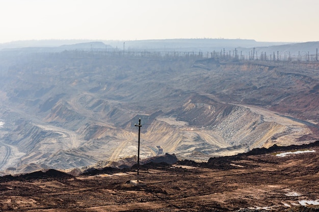 View on iron ore quarry in a dust haze