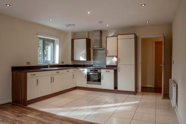 View of a kitchen area in a modern open plan apartment living area