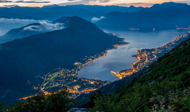 View of Kotor Bay from a high mountain peak at sunset.