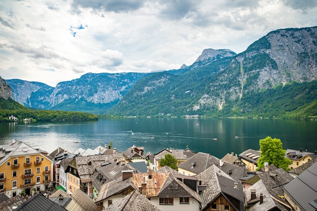 View on lake in austrian town hallstatt during tourist season in summer